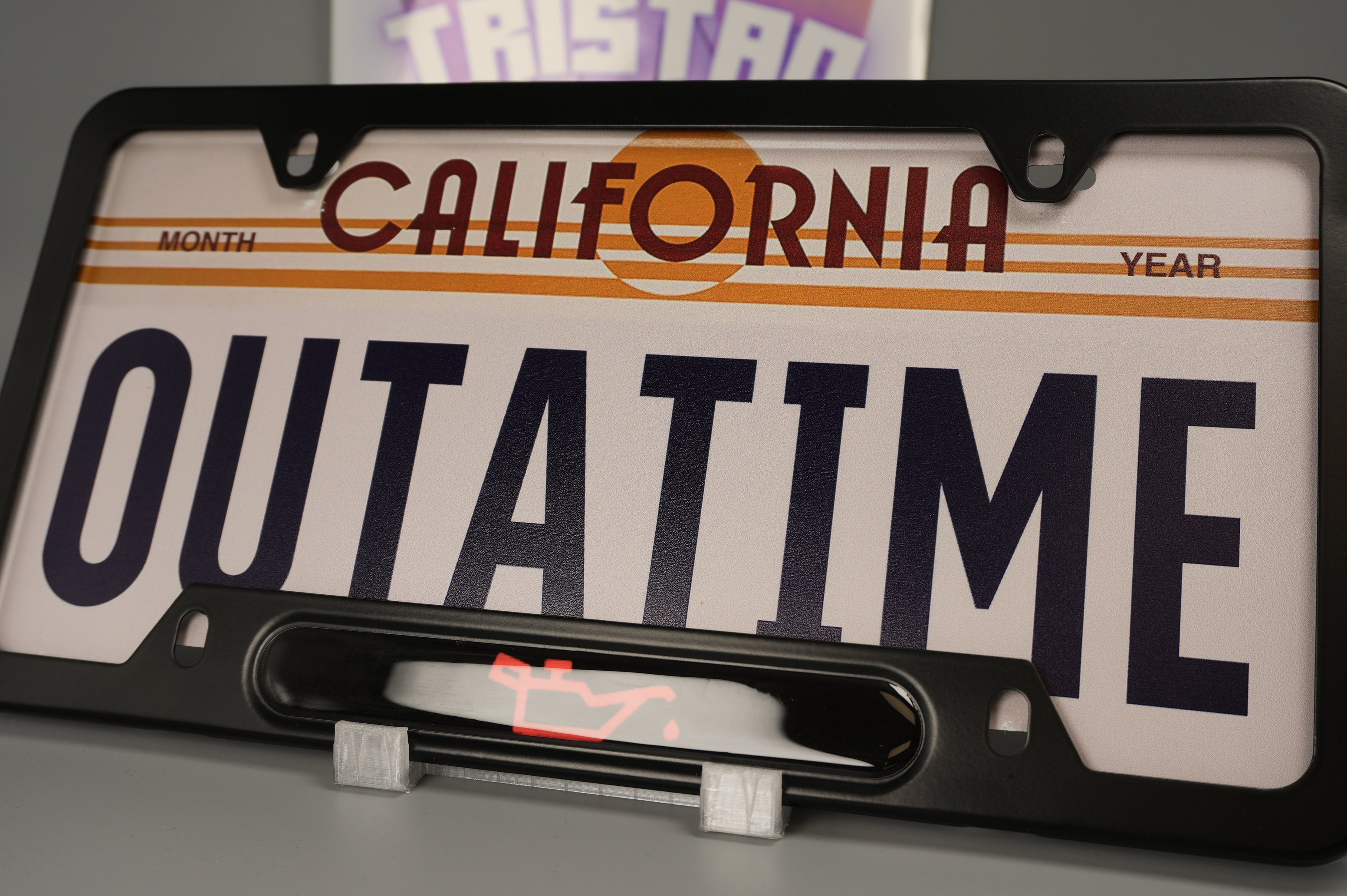 License plate frame aluminum CEL - LOW OIL