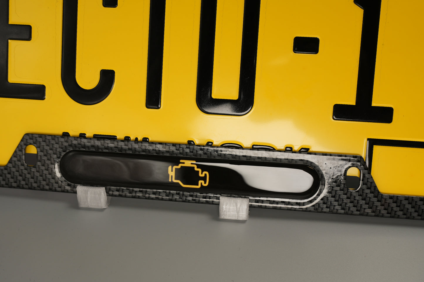 License plate frame aluminum CEL - Engine light logo